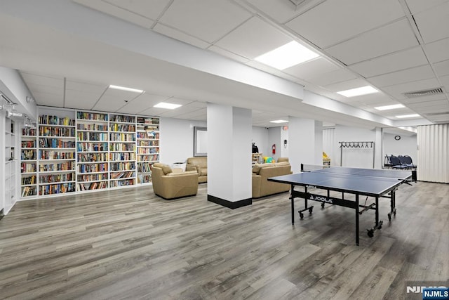 555 N Ave Unit 15W, Fort Lee, NJ 07024 - rec room featuring a drop ceiling and wood finished floors