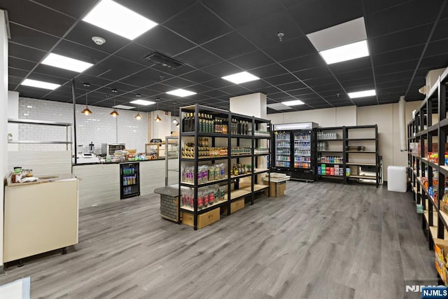 555 N Ave Unit 15W, Fort Lee, NJ 07024 - misc room featuring wood finished floors, a paneled ceiling, and beverage cooler