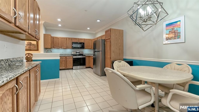 2 Richmond Rd Unit 306, West Milford, NJ 07480 - kitchen featuring stainless steel appliances, ornamental molding, a chandelier, brown cabinets, and light tile patterned flooring