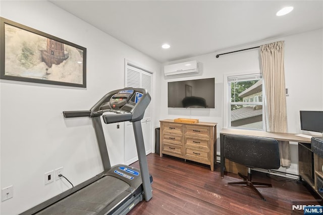 18 Lee Ave, Jefferson Township, NJ 07849 - workout area featuring an AC wall unit, dark wood-style floors, and recessed lighting