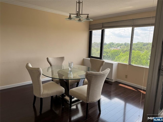 6 Horizon Rd Unit 604, Fort Lee, NJ 07024 - dining area with a chandelier, dark wood-style floors, and crown molding