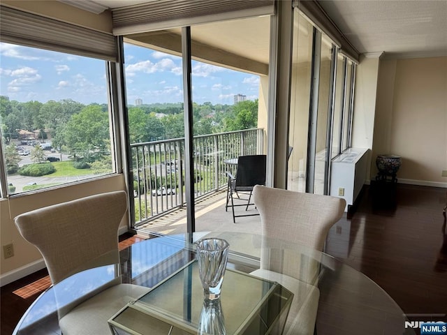 6 Horizon Rd Unit 604, Fort Lee, NJ 07024 - dining area featuring wood finished floors, plenty of natural light, and crown molding