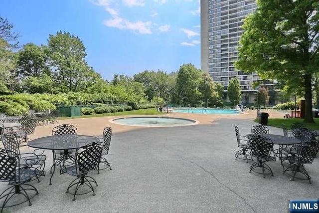 6 Horizon Rd Unit 604, Fort Lee, NJ 07024 - community pool featuring a patio and a community hot tub