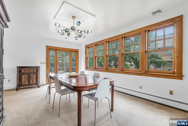 518 Standish Rd, Teaneck, NJ 07666 - dining room featuring a baseboard radiator and light carpet