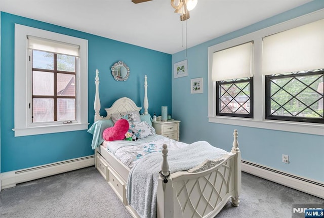 518 Standish Rd, Teaneck, NJ 07666 - carpeted bedroom with a baseboard radiator and a ceiling fan