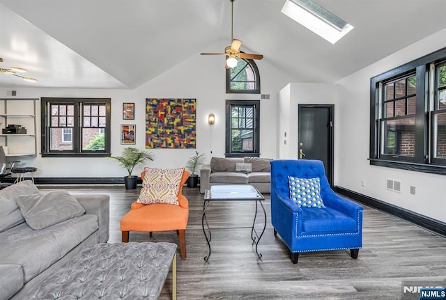 518 Standish Rd, Teaneck, NJ 07666 - living area featuring a ceiling fan, wood finished floors, plenty of natural light, and high vaulted ceiling