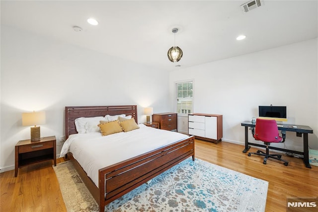 87 Centre St Unit 2, Nutley, NJ 07110 - bedroom with light wood-style floors, recessed lighting, and an office area
