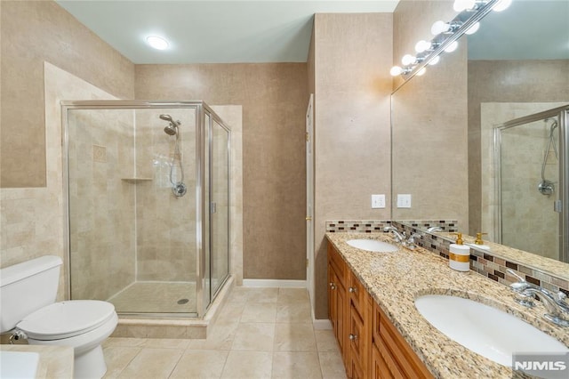 87 Centre St Unit 2, Nutley, NJ 07110 - full bathroom featuring tile patterned flooring, double vanity, and a shower stall