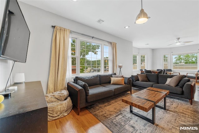 87 Centre St Unit 2, Nutley, NJ 07110 - living area with light wood finished floors, ceiling fan, and recessed lighting