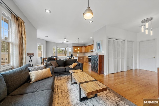 87 Centre St Unit 2, Nutley, NJ 07110 - living area with light wood-style floors, a ceiling fan, and recessed lighting