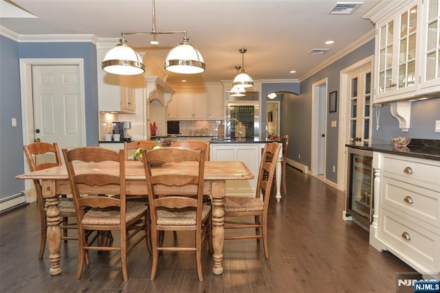 581 Eder Ave, Wyckoff, NJ 07481 - dining space featuring beverage cooler, crown molding, dark wood-style floors, recessed lighting, and a baseboard heating unit