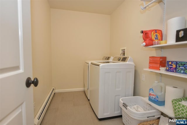 581 Eder Ave, Wyckoff, NJ 07481 - laundry room featuring a baseboard heating unit and independent washer and dryer