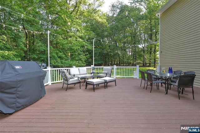 581 Eder Ave, Wyckoff, NJ 07481 - wooden terrace featuring a grill, an outdoor hangout area, outdoor dining area, and view of wooded area
