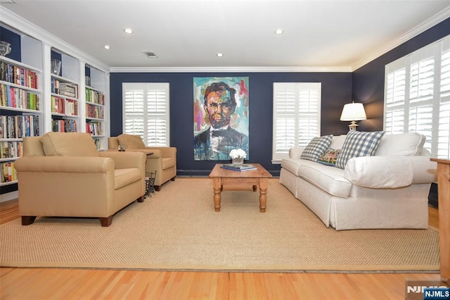 581 Eder Ave, Wyckoff, NJ 07481 - living area with wood finished floors, crown molding, recessed lighting, and built in shelves