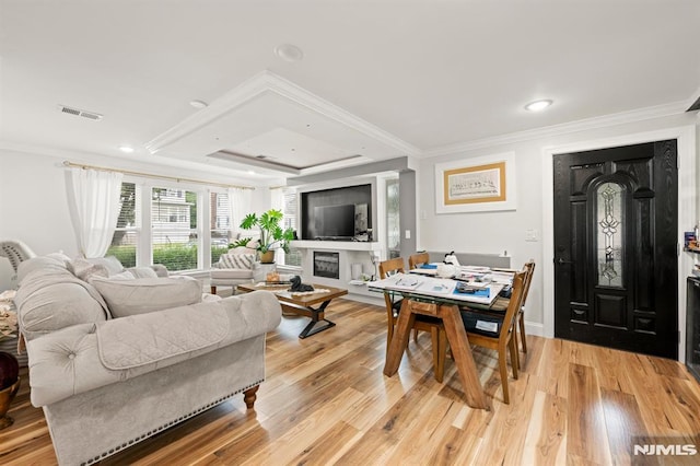 36 Kent, Newark, NJ 07108 - living area featuring crown molding, light wood finished floors, recessed lighting, a fireplace, and a tray ceiling