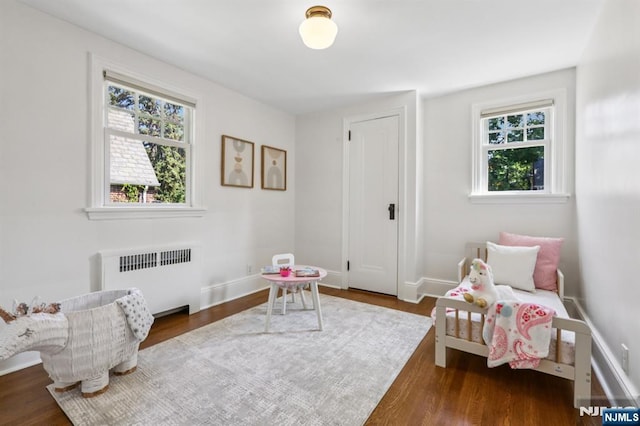 122 Howard Ter, Leonia, NJ 07605 - living area with radiator and wood finished floors