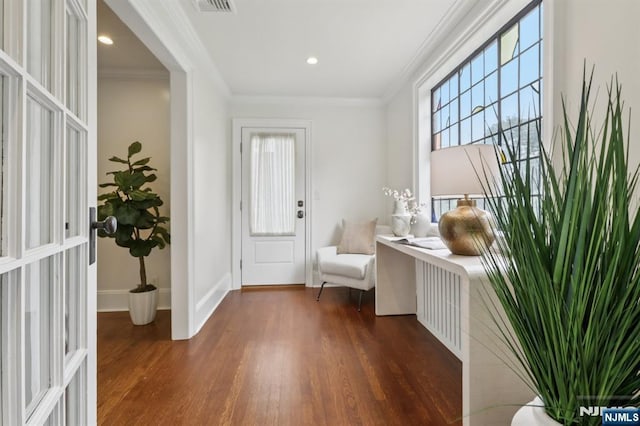 122 Howard Ter, Leonia, NJ 07605 - entryway with wood finished floors, ornamental molding, and recessed lighting