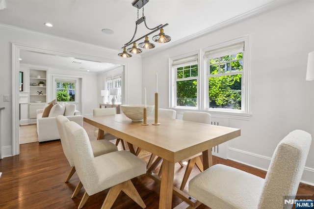 122 Howard Ter, Leonia, NJ 07605 - dining space with ornamental molding, plenty of natural light, dark wood-style floors, recessed lighting, and built in shelves