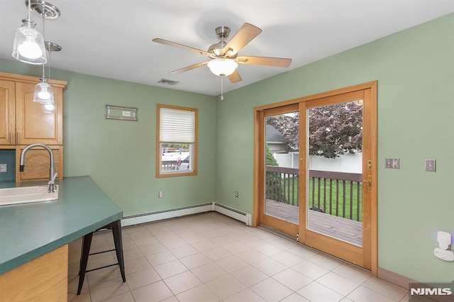 59 Parkview Ave, Elmwood Park, NJ 07407 - unfurnished dining area with healthy amount of natural light, ceiling fan, and a baseboard heating unit