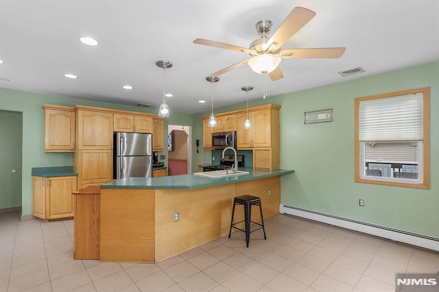 59 Parkview Ave, Elmwood Park, NJ 07407 - kitchen with stainless steel appliances, baseboard heating, a peninsula, ceiling fan, and recessed lighting