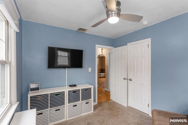 59 Parkview Ave, Elmwood Park, NJ 07407 - bedroom with carpet, arched walkways, a closet, and a ceiling fan