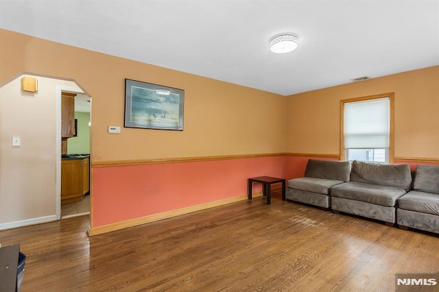 59 Parkview Ave, Elmwood Park, NJ 07407 - living area with wood finished floors and arched walkways