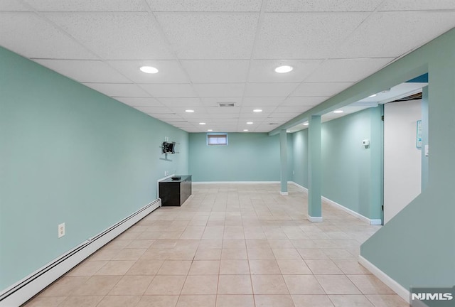 59 Parkview Ave, Elmwood Park, NJ 07407 - finished basement featuring a baseboard radiator, recessed lighting, a paneled ceiling, and tile patterned floors