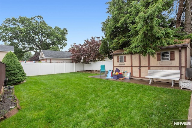 59 Parkview Ave, Elmwood Park, NJ 07407 - fenced backyard featuring a storage shed