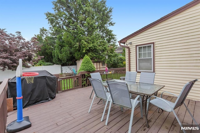59 Parkview Ave, Elmwood Park, NJ 07407 - wooden deck with outdoor dining area and a grill
