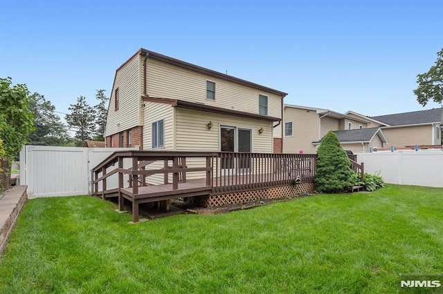 59 Parkview Ave, Elmwood Park, NJ 07407 - back of property featuring a deck and a fenced backyard