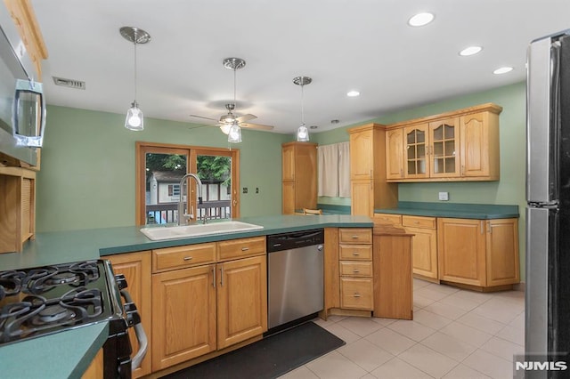 59 Parkview Ave, Elmwood Park, NJ 07407 - kitchen featuring appliances with stainless steel finishes, pendant lighting, light tile patterned floors, ceiling fan, and glass insert cabinets