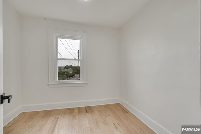 115 Wilson Ave, Rutherford, NJ 07070 - empty room featuring light wood finished floors and baseboards
