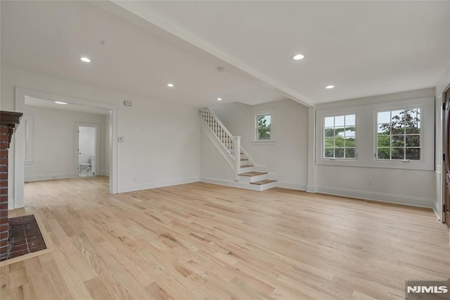 115 Wilson Ave, Rutherford, NJ 07070 - unfurnished living room featuring light wood-type flooring, stairway, and recessed lighting