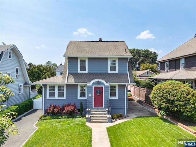 188 Wheaton Pl, Rutherford, NJ 07070 - view of front facade with a shingled roof and a chimney