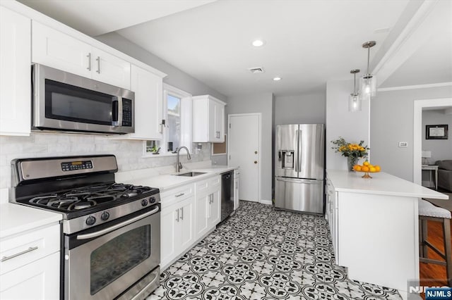 188 Wheaton Pl, Rutherford, NJ 07070 - kitchen featuring stainless steel appliances, light countertops, backsplash, white cabinetry, and a kitchen breakfast bar