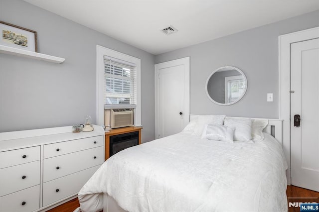 188 Wheaton Pl, Rutherford, NJ 07070 - bedroom featuring cooling unit and dark wood-style floors