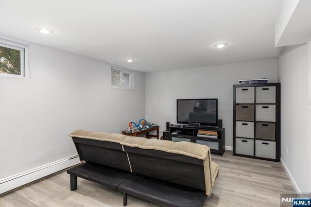 188 Wheaton Pl, Rutherford, NJ 07070 - living room with a baseboard radiator, light wood-style flooring, and recessed lighting