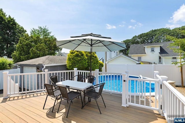 188 Wheaton Pl, Rutherford, NJ 07070 - deck featuring outdoor dining space, a fenced backyard, and an outbuilding
