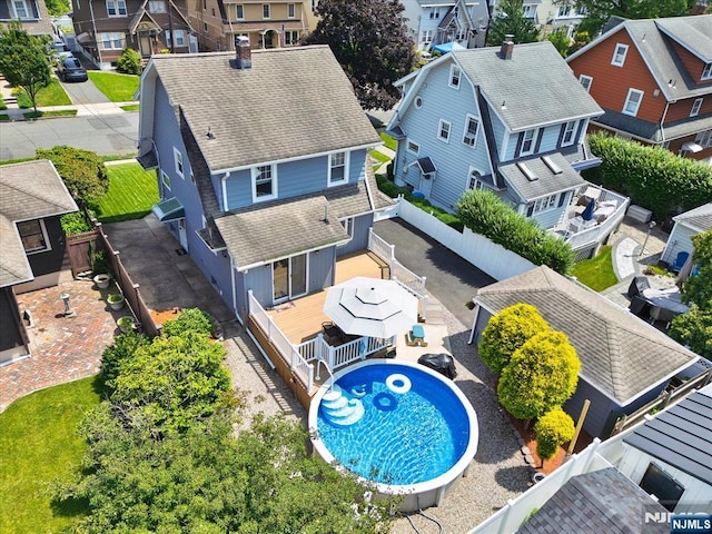 188 Wheaton Pl, Rutherford, NJ 07070 - aerial perspective of suburban area with a pool area