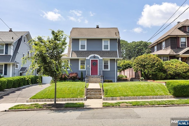 188 Wheaton Pl, Rutherford, NJ 07070 - view of front of home with a front lawn and roof with shingles