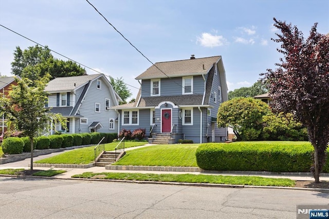 188 Wheaton Pl, Rutherford, NJ 07070 - view of front facade with roof with shingles and a front lawn