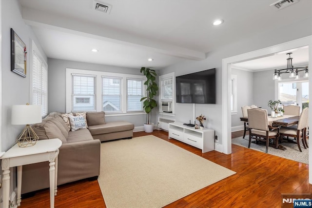 188 Wheaton Pl, Rutherford, NJ 07070 - living area with radiator, recessed lighting, a chandelier, dark wood-style floors, and beam ceiling