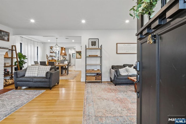 21 Mountainview Ave, Nutley, NJ 07110 - living area with light wood finished floors, recessed lighting, and a fireplace