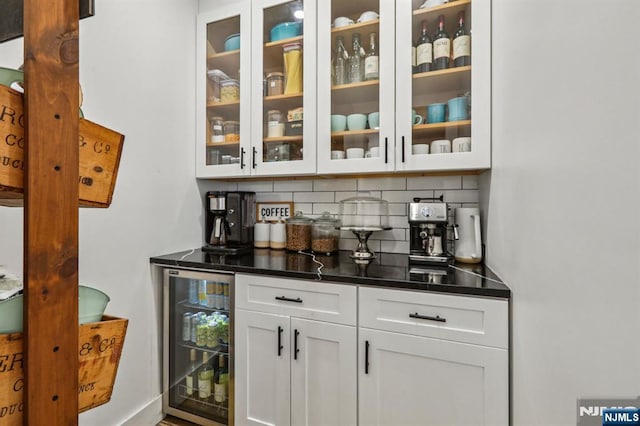21 Mountainview Ave, Nutley, NJ 07110 - bar area with beverage cooler and decorative backsplash