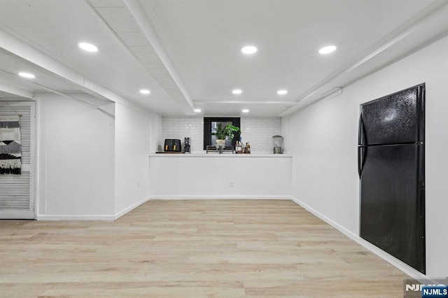21 Mountainview Ave, Nutley, NJ 07110 - basement with recessed lighting, wood finished floors, and freestanding refrigerator