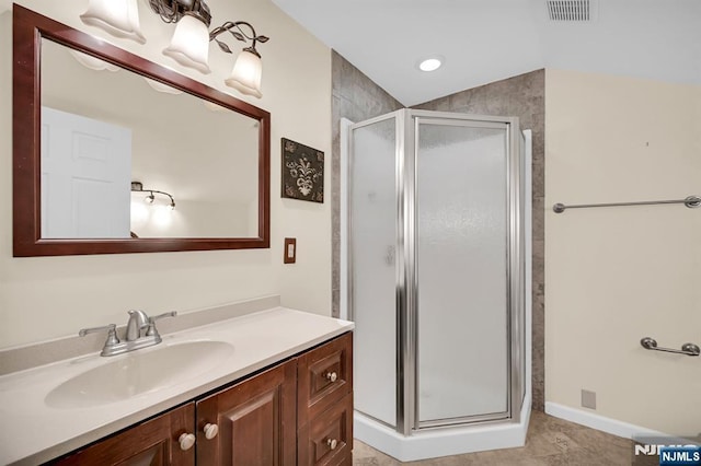 74 Bartholdi Ave, Butler Borough, NJ 07405 - bathroom with a shower stall and vanity