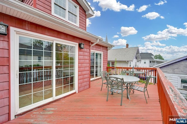 74 Bartholdi Ave, Butler Borough, NJ 07405 - wooden deck featuring outdoor dining space