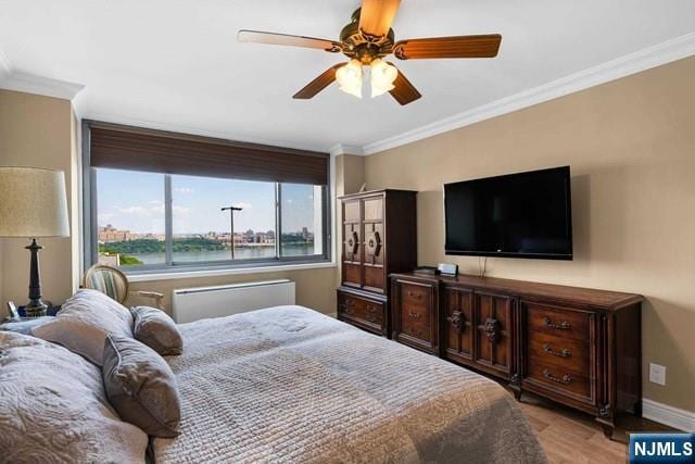 1600 Parker Ave Unit 1G, Fort Lee, NJ 07024 - bedroom with crown molding, light wood finished floors, and ceiling fan