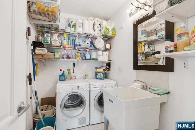 1600 Parker Ave Unit 1G, Fort Lee, NJ 07024 - laundry room featuring washing machine and clothes dryer and light wood-style floors