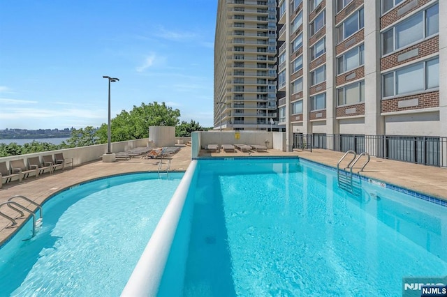 1600 Parker Ave Unit 1G, Fort Lee, NJ 07024 - community pool featuring a patio